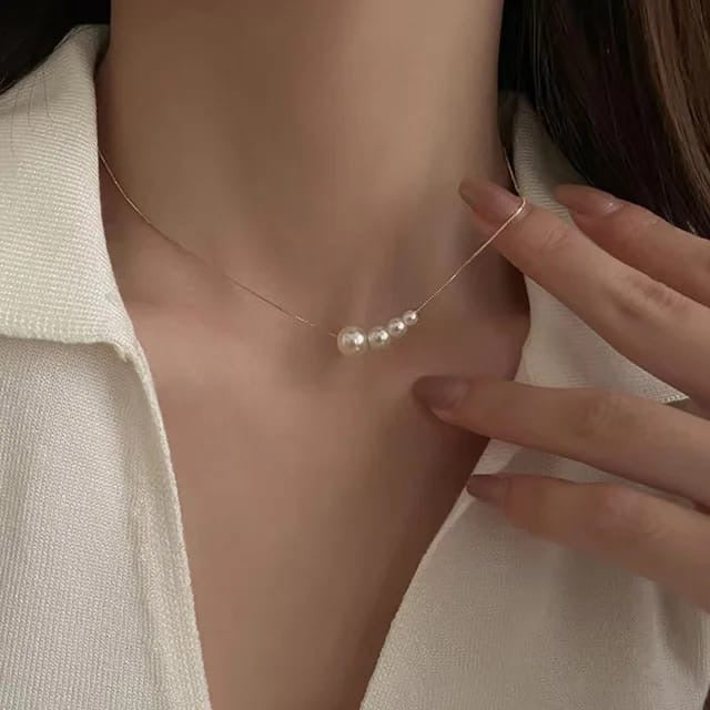 3204939C-E596-4B3B-94AC-297F599B8ACB Elegant Four Pearl Pendant Minimal Thin Snake-chain - Image 1